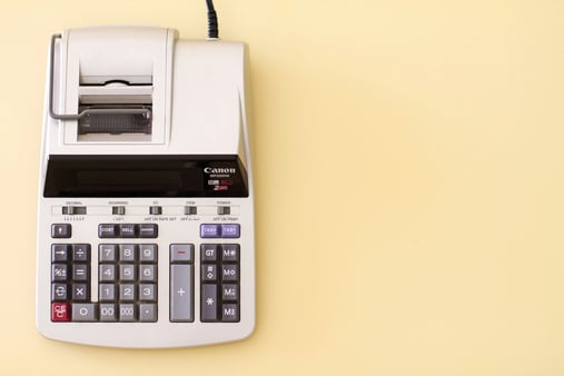 budget calculator on yellow background
