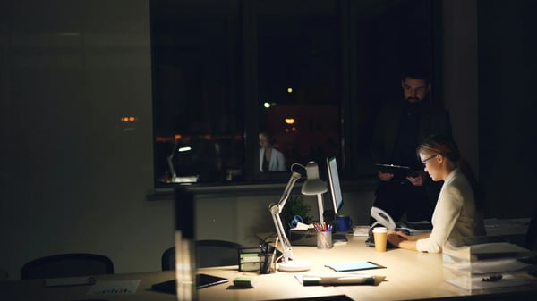 Finance worker working late in EOFY